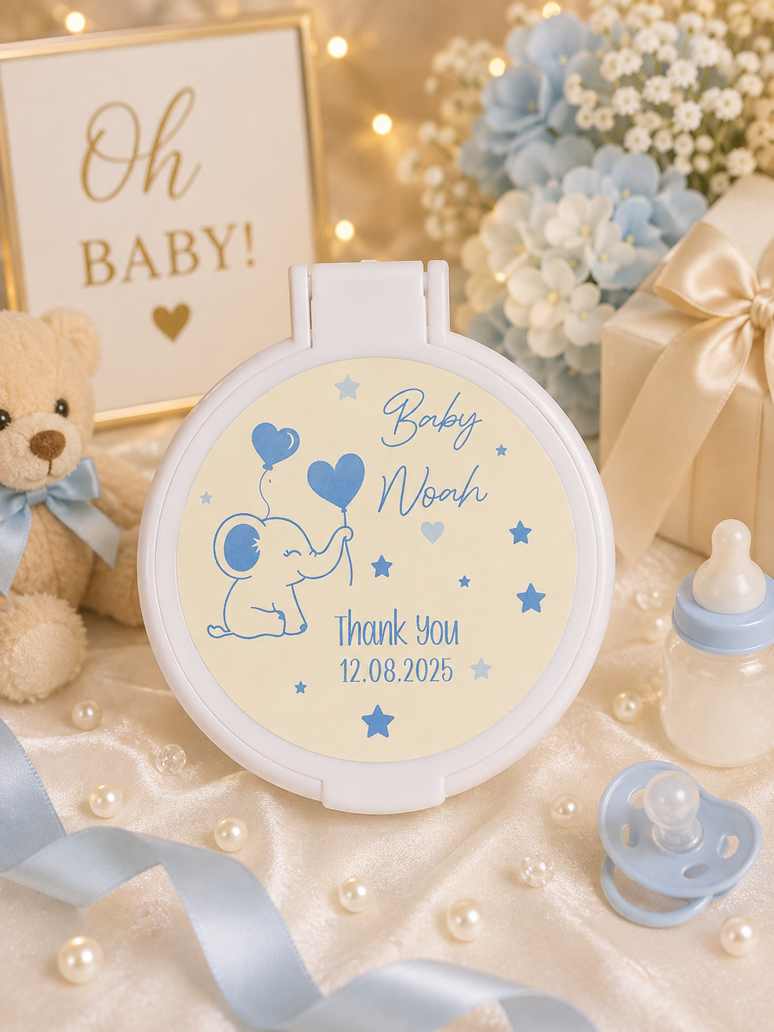 Personalised baby shower compact mirror favour showing one of the available celebration designs.