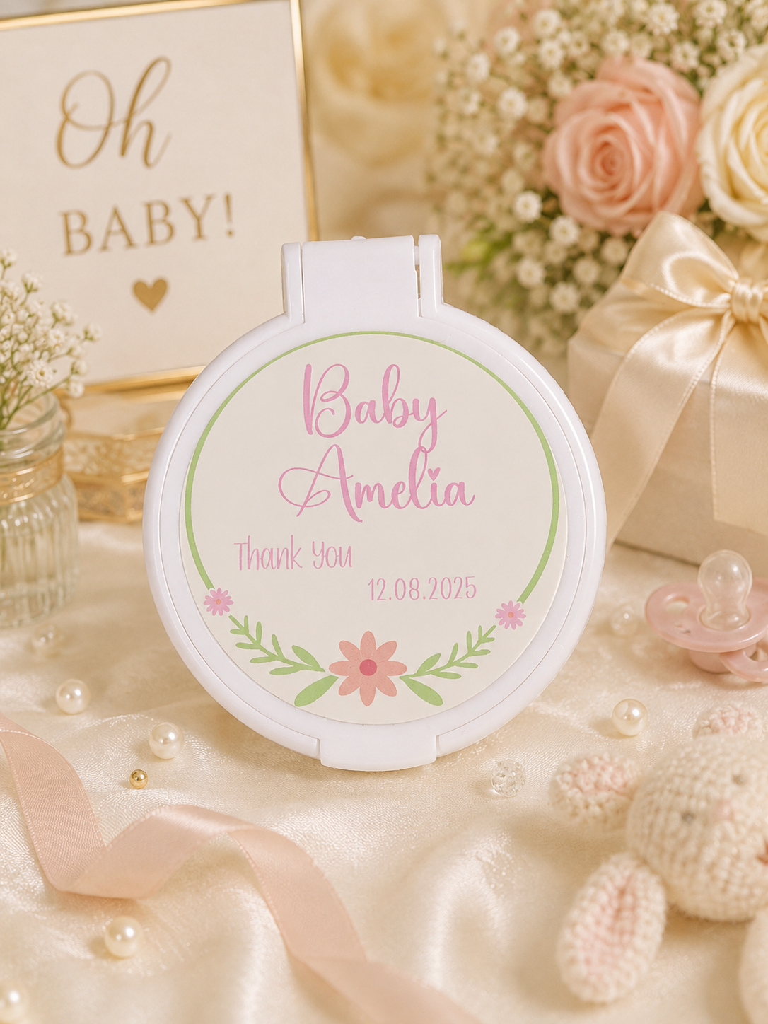     Personalised Floral Watercolor compact mirror baby shower favour featuring delicate pink flowers and leafy greenery with a custom name and date.