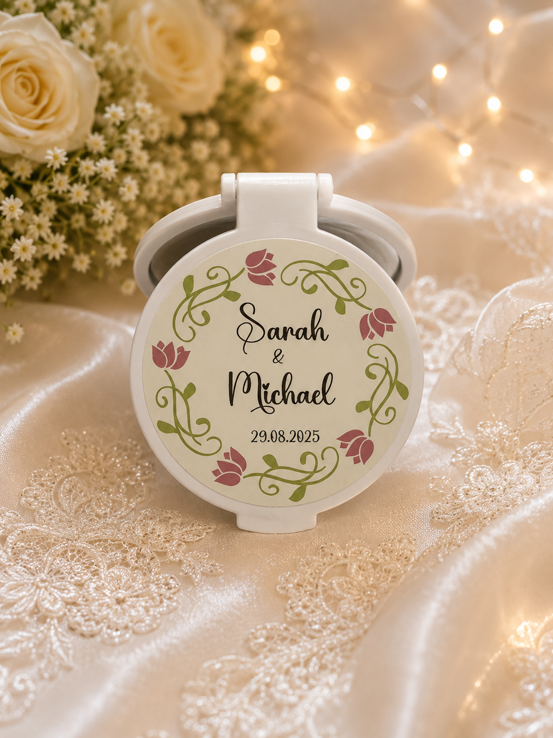 Personalised wedding compact mirror favour with elegant floral wreath design, featuring Sarah & Michael and wedding date